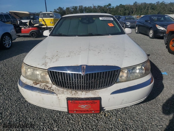 2000 Lincoln Continental with VIN 1LNHM97V0YY795279, listed as a Copart auction lot 76456684 with 0 mi miles and Salvage Title. Bid and sale history available at carsss.com. Image 5.