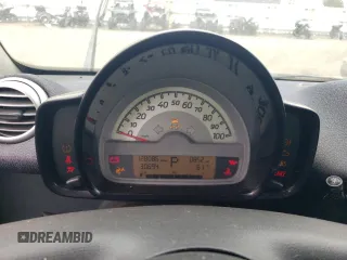 2012 Smart fortwo Pure с VIN WMEEJ3BA1CK573090, выставлен на аукционе Copart как лот 59881025 с пробегом 128 086 миль миль и Чистый • Clean title. История ставок и продаж доступна на DreamBid. Изображение 9.