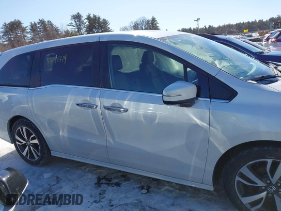 2023 Honda Odyssey Touring with VIN 5FNRL6H81PB008129, listed as a IAAI auction lot 41610714 with 57,273 mi miles and . Bid and sale history available at DreamBid. Image 13.