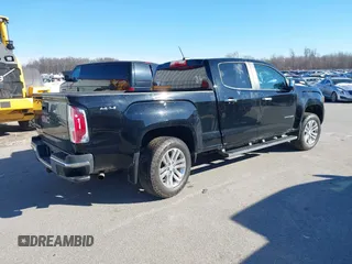 2015 GMC Canyon 4WD SLT z VIN 1GTG6CE33F1134747, wystawiony jako IAAI lot #41502300 z przebiegiem 143 027 mil mil oraz . Historia ofert i sprzedaży dostępna na DreamBid. Obrazek 4.