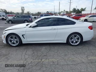 2019 BMW 4 Series 430i with VIN WBA4W3C5XKAF93081, listed as a IAAI auction lot 41689477 with 87,936 mi miles and . Bid and sale history available at DreamBid. Image 15.