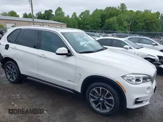 2018 BMW X5 xDrive35i z VIN 5UXKR0C50JL075205, wystawiony jako IAAI lot #42231107 z przebiegiem 38 412 mil mil oraz . Historia ofert i sprzedaży dostępna na DreamBid. Obrazek 1.