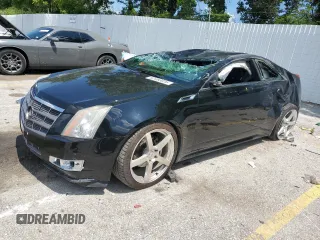 2011 Cadillac CTS Performance with VIN 1G6DK1ED3B0146122, listed as a Copart auction lot 63493035 with 141,225 mi miles and Salvage title. Bid and sale history available at DreamBid. Image 1.