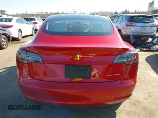 2021 Tesla Model 3 Long Range with VIN 5YJ3E1EBXMF990242, listed as a IAAI auction lot 41674222 with 24,554 mi miles and . Bid and sale history available at DreamBid. Image 16.