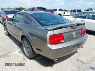 2005 Ford Mustang Deluxe with VIN 1ZVFT80NX55145615, listed as a IAAI auction lot 42511360 with 236,242 mi miles and . Bid and sale history available at DreamBid. Image 3.