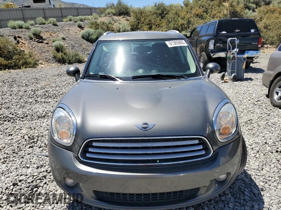 2014 MINI Countryman with VIN WMWZB3C56EWR38919, listed as a Copart auction lot 61385865 with 127,368 mi miles and Salvage title. Bid and sale history available at DreamBid. Image 5.