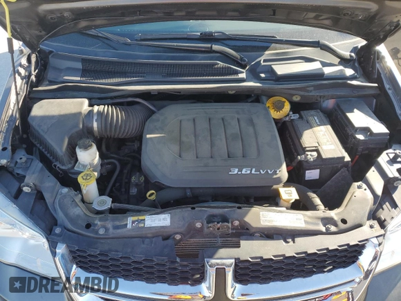 2017 Dodge Grand Caravan SE z VIN 2C4RDGBG0HR731222, wystawiony jako Copart lot #52638415 z przebiegiem 75 427 mil mil oraz Szkoda całkowita • Salvage title. Historia ofert i sprzedaży dostępna na DreamBid. Obrazek 12.