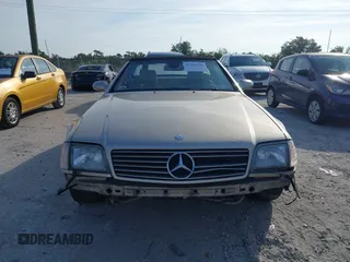 2000 Mercedes-Benz SL 500 z VIN WDBFA68F6YF194611, wystawiony jako IAAI lot #42362699 z przebiegiem 120 647 mil mil oraz . Historia ofert i sprzedaży dostępna na DreamBid. Obrazek 13.