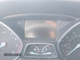 2015 Ford Focus SE z VIN 1FADP3F24FL283927, wystawiony jako IAAI lot #41755250 z przebiegiem Nie podano mil oraz . Historia ofert i sprzedaży dostępna na DreamBid. Obrazek 15.