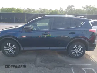 2017 Toyota RAV4 LE with VIN JTMZFREV4HJ136104, listed as a IAAI auction lot 42077699 with 120,360 mi miles and . Bid and sale history available at carsss.com. Image 14.