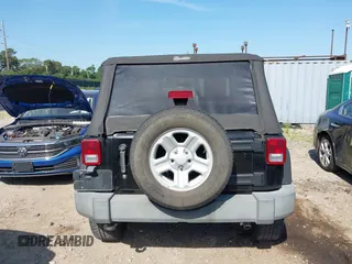 2009 Jeep Wrangler X with VIN 1J4FA24179L711352, listed as a IAAI auction lot 42577898 with 133,309 mi miles and . Bid and sale history available at DreamBid. Image 16.