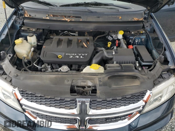 2013 Dodge Journey American Value with VIN 3C4PDCAB6DT577273, listed as a Copart auction lot 50627295 with 139,775 mi miles and Salvage title. Bid and sale history available at DreamBid. Image 14.