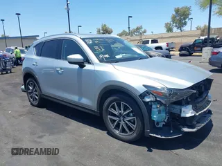 2018 Mazda CX-5 Grand Touring with VIN JM3KFBDM3J0343782, listed as a IAAI auction lot 42527044 with 60,180 mi miles and . Bid and sale history available at DreamBid. Image 14.