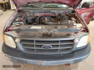 2004 Ford F-150 Heritage XL with VIN 2FTRF17234CA52384, listed as a IAAI auction lot 41096595 with 284,992 mi miles. Bid and sale history available at carsss.com. Image 10.