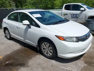 2012 Honda Civic LX z VIN 19XFB2F56CE100666, wystawiony jako IAAI lot #42138931 z przebiegiem 116 544 mil mil oraz . Historia ofert i sprzedaży dostępna na DreamBid. Obrazek 1.