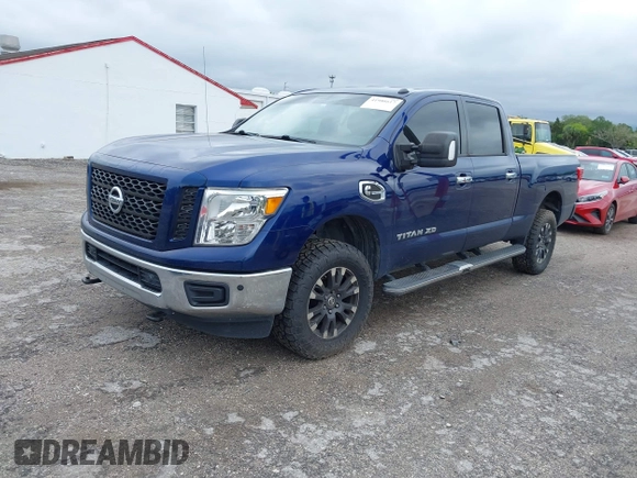 2019 Nissan Titan XD SV with VIN 1N6BA1F46KN514637, listed as a IAAI auction lot 41986617 with 123,872 mi miles. Bid and sale history available at carsss.com. Image 17.