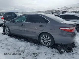 2015 Toyota Camry LE with VIN 4T1BD1FK0FU170805, listed as a Copart auction lot 55497145 with 101,121 mi miles and Salvage Title. Bid and sale history available at DreamBid. Image 2.