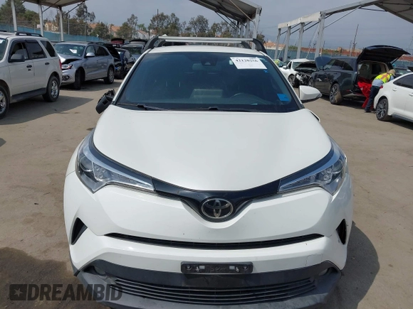 2019 Toyota C-HR XLE with VIN JTNKHMBX9K1054053, listed as a IAAI auction lot 42120256 with 67,083 mi miles and . Bid and sale history available at DreamBid. Image 12.