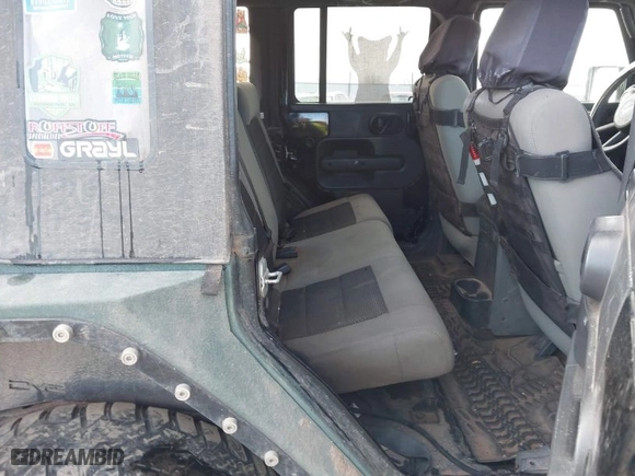 2010 Jeep Wrangler Unlimited Sport with VIN 1J4BA3H12AL230749, listed as a IAAI auction lot 41052278 with 156,217 mi miles. Bid and sale history available at carsss.com. Image 8.