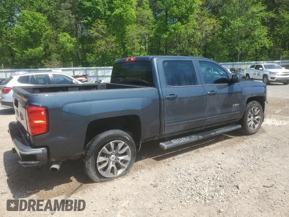 2018 Chevrolet Silverado 1500 LT with VIN 3GCPCREC1JG519228, listed as a Copart auction lot 52293035 with 102,436 mi miles and Salvage Title. Bid and sale history available at DreamBid. Image 3.