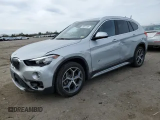 2018 BMW X1 sDrive28i with VIN WBXHU7C3XJ5H38873, listed as a Copart auction lot 49822205 with 46,847 mi miles and Salvage Title. Bid and sale history available at carsss.com. Image 1.