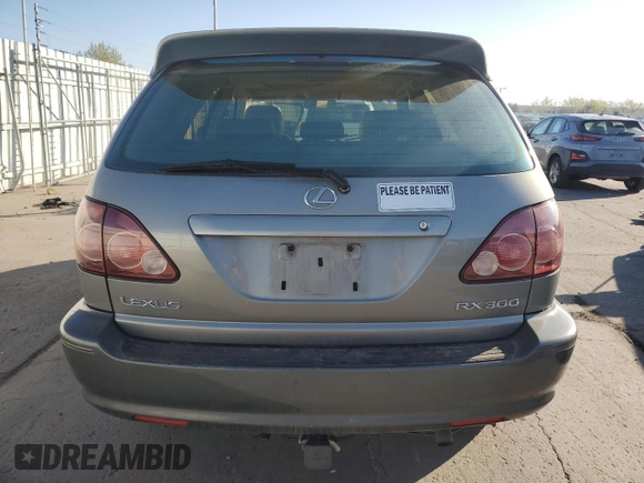 2000 Lexus RX 300 z VIN JT6HF10U3Y0116533, wystawiony jako Copart lot #55123085 z przebiegiem 187 653 mil mil oraz Szkoda całkowita • Salvage title. Historia ofert i sprzedaży dostępna na DreamBid. Obrazek 6.