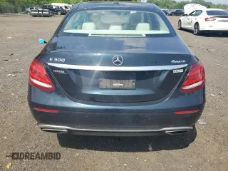 2017 Mercedes-Benz E 300 Luxury with VIN WDDZF4KBXHA185598, listed as a Copart auction lot 61011935 with 59,116 mi miles and Salvage title. Bid and sale history available at DreamBid. Image 6.