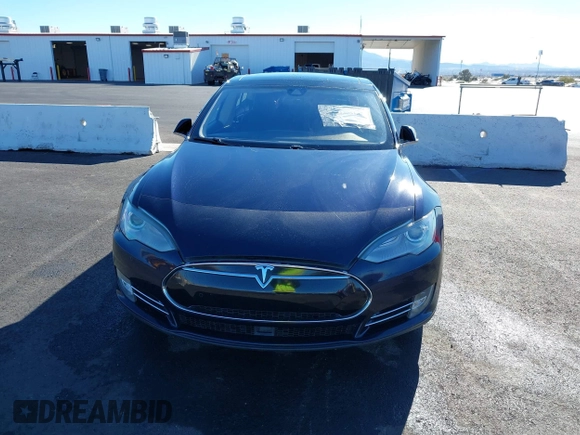 2014 Tesla Model S 60 with VIN 5YJSA1H14EFP57209, listed as a IAAI auction lot 41305157 with 141,364 mi miles and . Bid and sale history available at DreamBid. Image 13.