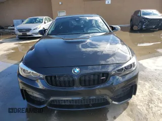 2019 BMW M4 with VIN WBS4Y9C57KAG67209, listed as a Copart auction lot 44204445 with 52,605 mi miles and Salvage Title. Bid and sale history available at carsss.com. Image 5.