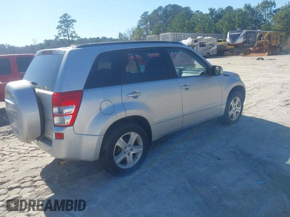 2007 Suzuki Grand Vitara Luxury z VIN JS3TD947074204900, wystawiony jako IAAI lot #41488003 z przebiegiem 187 502 mil mil oraz . Historia ofert i sprzedaży dostępna na DreamBid. Obrazek 4.