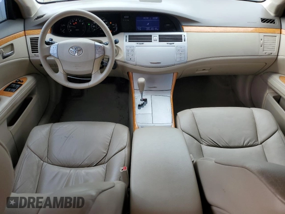 2007 Toyota Avalon XL z VIN 4T1BK36B17U230285, wystawiony jako Copart lot #60976495 z przebiegiem 63 013 mil mil oraz Szkoda całkowita • Salvage title. Historia ofert i sprzedaży dostępna na DreamBid. Obrazek 8.