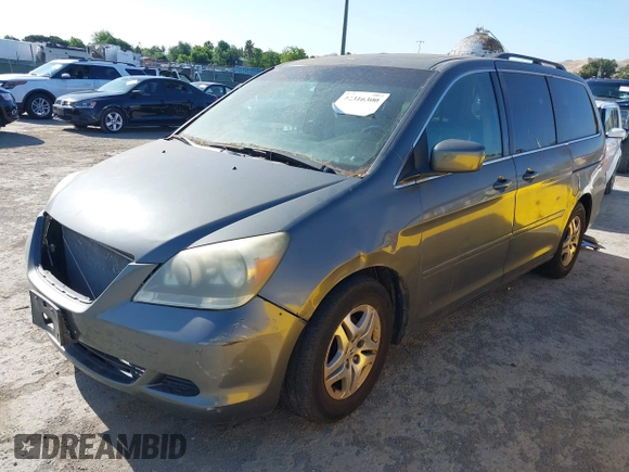 2007 Honda Odyssey EX-L z VIN 5FNRL38647B443269, wystawiony jako IAAI lot #42316300 z przebiegiem 121 616 mil mil oraz . Historia ofert i sprzedaży dostępna na DreamBid. Obrazek 2.