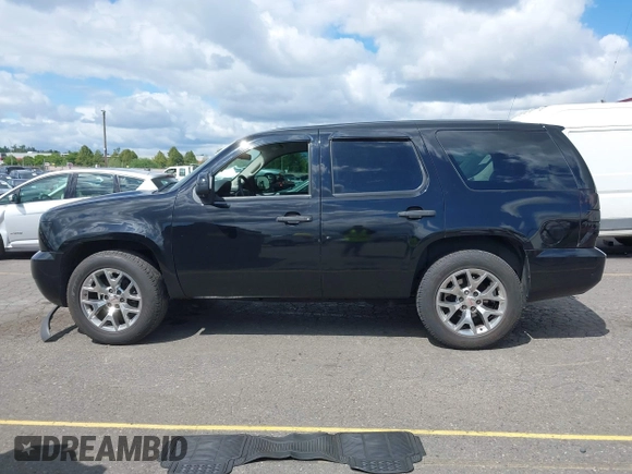 2011 Chevrolet Tahoe Commercial with VIN 1GNLC2E09BR156939, listed as a IAAI auction lot 42280594 with 181,581 mi miles and . Bid and sale history available at DreamBid. Image 14.