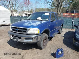 1997 Ford F-150 XL with VIN 1FTDX18W4VNB57679, listed as a IAAI auction lot 41918107 with 132,960 mi miles. Bid and sale history available at carsss.com. Image 2.