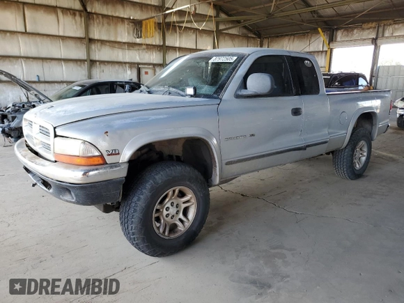 1999 Dodge Dakota SLT with VIN 1B7GG22Y0XS259031, listed as a Copart auction lot 87972505 with 153,354 mi miles and Salvage Title. Bid and sale history available at DreamBid. Image 1.