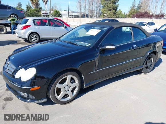 2009 Mercedes-Benz CLK-Class 3.5L with VIN WDBTK56GX9T107902, listed as a IAAI auction lot 41867771 with 134,939 mi miles. Bid and sale history available at carsss.com. Image 2.