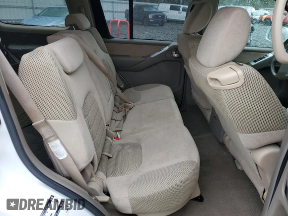 2010 Nissan Pathfinder SE z VIN 5N1AR1NB2AC605384, wystawiony jako Copart lot #52105735 z przebiegiem 138 019 mil mil oraz Szkoda całkowita • Salvage title. Historia ofert i sprzedaży dostępna na DreamBid. Obrazek 11.