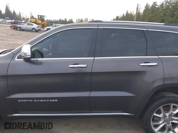2015 Jeep Grand Cherokee Summit with VIN 1C4RJFJTXFC911170, listed as a IAAI auction lot 41523164 with 74,133 mi miles. Bid and sale history available at carsss.com. Image 14.