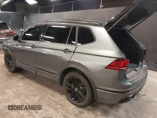 2022 Volkswagen Tiguan SE R-Line Black with VIN 3VV8B7AX1NM111194, listed as a IAAI auction lot 42254124 with 22,748 mi miles and . Bid and sale history available at DreamBid. Image 3.