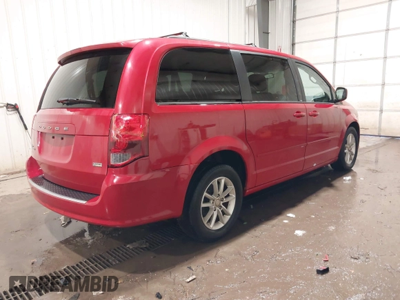2013 Dodge Grand Caravan SXT with VIN 2C4RDGCG9DR669053, listed as a IAAI auction lot 41626033 with 170,007 mi miles and . Bid and sale history available at DreamBid. Image 4.