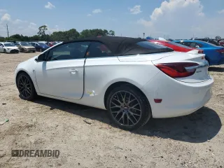2016 Buick Cascada Premium с VIN W04WT3N57GG152036, выставлен на аукционе Copart как лот 67237824 с пробегом 70 623 миль миль и Списание • Salvage title. История ставок и продаж доступна на DreamBid. Изображение 2.
