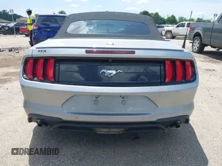2020 Ford Mustang EcoBoost z VIN 1FATP8UH6L5106537, wystawiony jako IAAI lot #42518474 z przebiegiem 86 971 mil mil oraz . Historia ofert i sprzedaży dostępna na DreamBid. Obrazek 16.