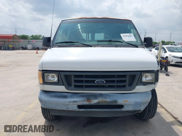 2003 Ford Econoline Cargo with VIN 1FTSE34L73HA39982, listed as a IAAI auction lot 42081487 with 350,687 mi miles and . Bid and sale history available at DreamBid. Image 12.