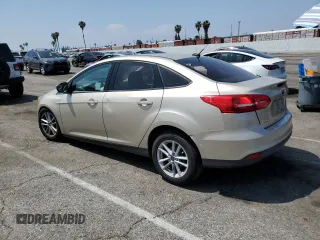 2018 Ford Focus SE z VIN 1FADP3F23JL303948, wystawiony jako Copart lot #55698915 z przebiegiem 85 500 mil mil oraz Szkoda całkowita • Salvage title. Historia ofert i sprzedaży dostępna na DreamBid. Obrazek 2.