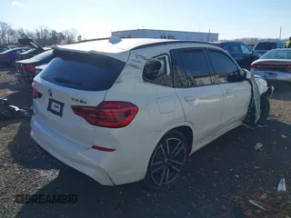 2020 BMW X3 M with VIN 5YMTS0C03L9B77591, listed as a IAAI auction lot 41015612 with 1 mi miles. Bid and sale history available at carsss.com. Image 4.