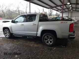 2017 Chevrolet Colorado 2WD Z71 z VIN 1GCGSDEN2H1166403, wystawiony jako IAAI lot #41750594 z przebiegiem 54 454 mil mil oraz . Historia ofert i sprzedaży dostępna na DreamBid. Obrazek 14.