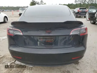 2023 Tesla Model 3 z VIN 5YJ3E1EA7PF668511, wystawiony jako Copart lot #51055725 z przebiegiem 53 594 mil mil oraz Szkoda całkowita • Salvage title. Historia ofert i sprzedaży dostępna na DreamBid. Obrazek 6.