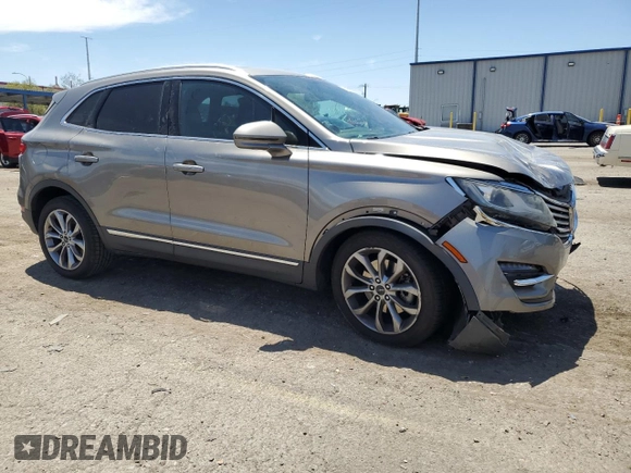 2017 Lincoln MKC Select with VIN 5LMCJ2C9XHUL34775, listed as a Copart auction lot 61188315 with 96,087 mi miles and Salvage title. Bid and sale history available at DreamBid. Image 4.
