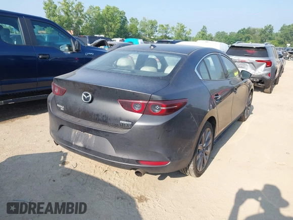 2019 Mazda 3 Premium with VIN JM1BPBEM6K1133340, listed as a IAAI auction lot 42711496 with 121,674 mi miles and . Bid and sale history available at DreamBid. Image 4.