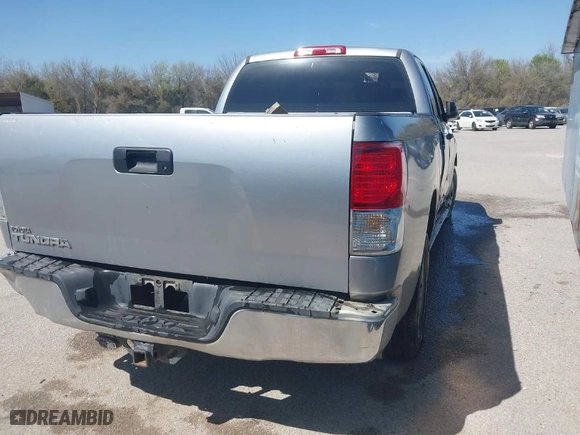 2010 Toyota Tundra 2WD Truck with VIN 5TFRM5F11AX019089, listed as a IAAI auction lot 41584147 with 290,360 mi miles. Bid and sale history available at carsss.com. Image 4.
